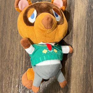 Brown and Green Stuffed Animal Toy